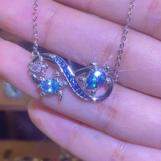 Three Turtle Opal Infinity Pendant Necklace