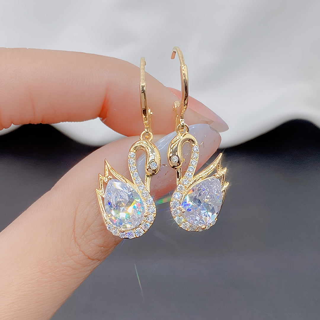 Golden Tone Swan Dangle Earrings