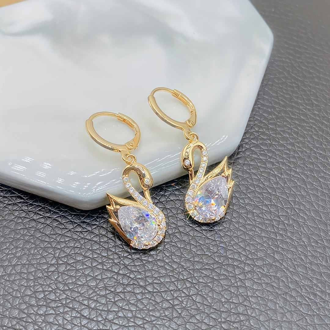 Golden Tone Swan Dangle Earrings